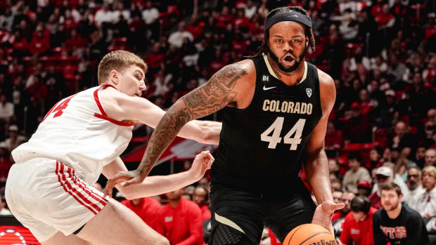 Eddie Lampkin Jr drives around Utah defender